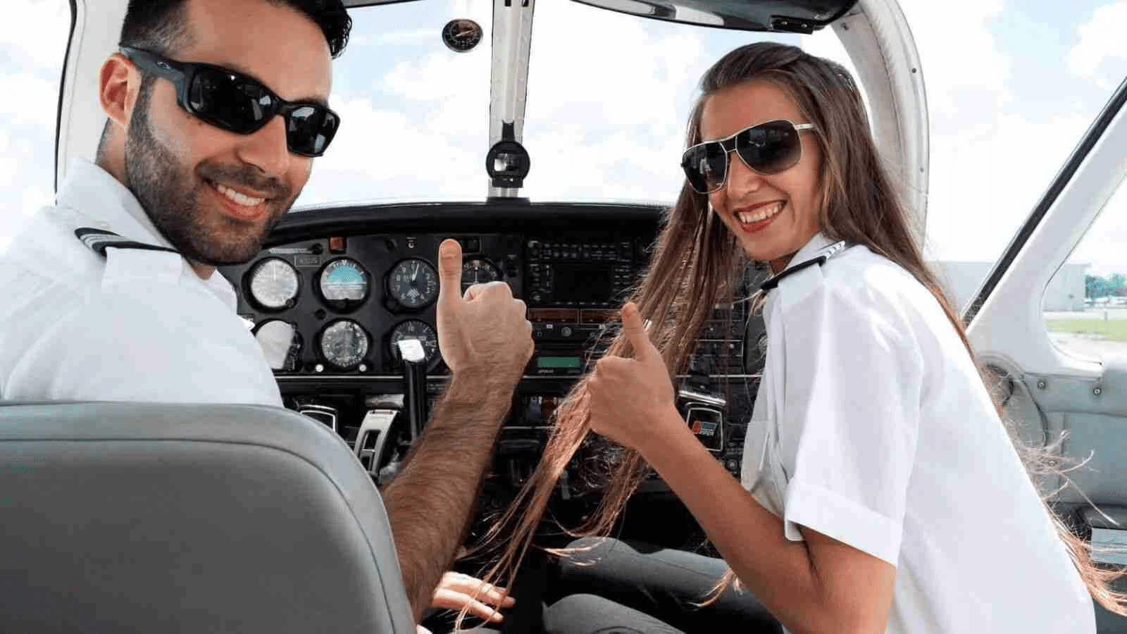 Smiling pilots in cabine